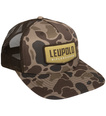 Snapback Trucker hat with classic brown camo colorway. Patch on front with words "Leupold Riflescopes". Great hat for fishing, hunting, and spending time in the outdoors. It has a pre-curved bill and adjustable one size fits all. 