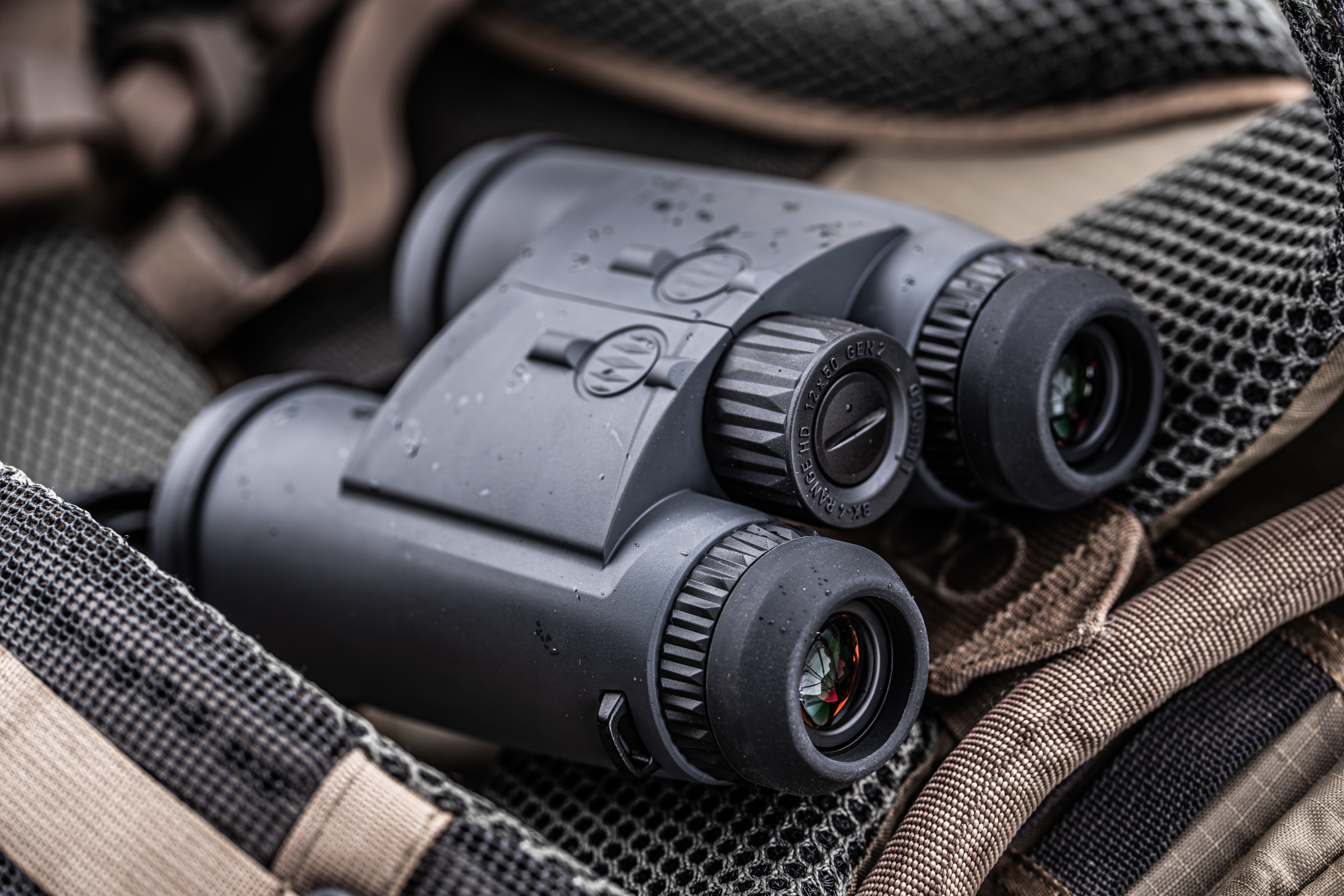 Leupold BX-4 Range HD Gen 2 Rangefinding Binocular laying on a backpack