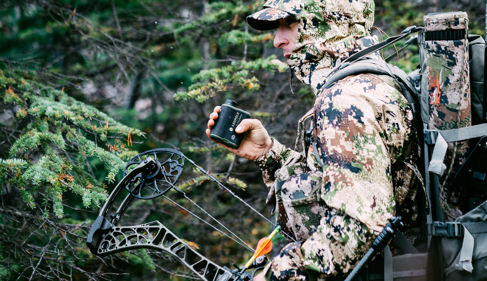 Product image of the new RX-FullDraw 5 on display with a hunter sitting behind.