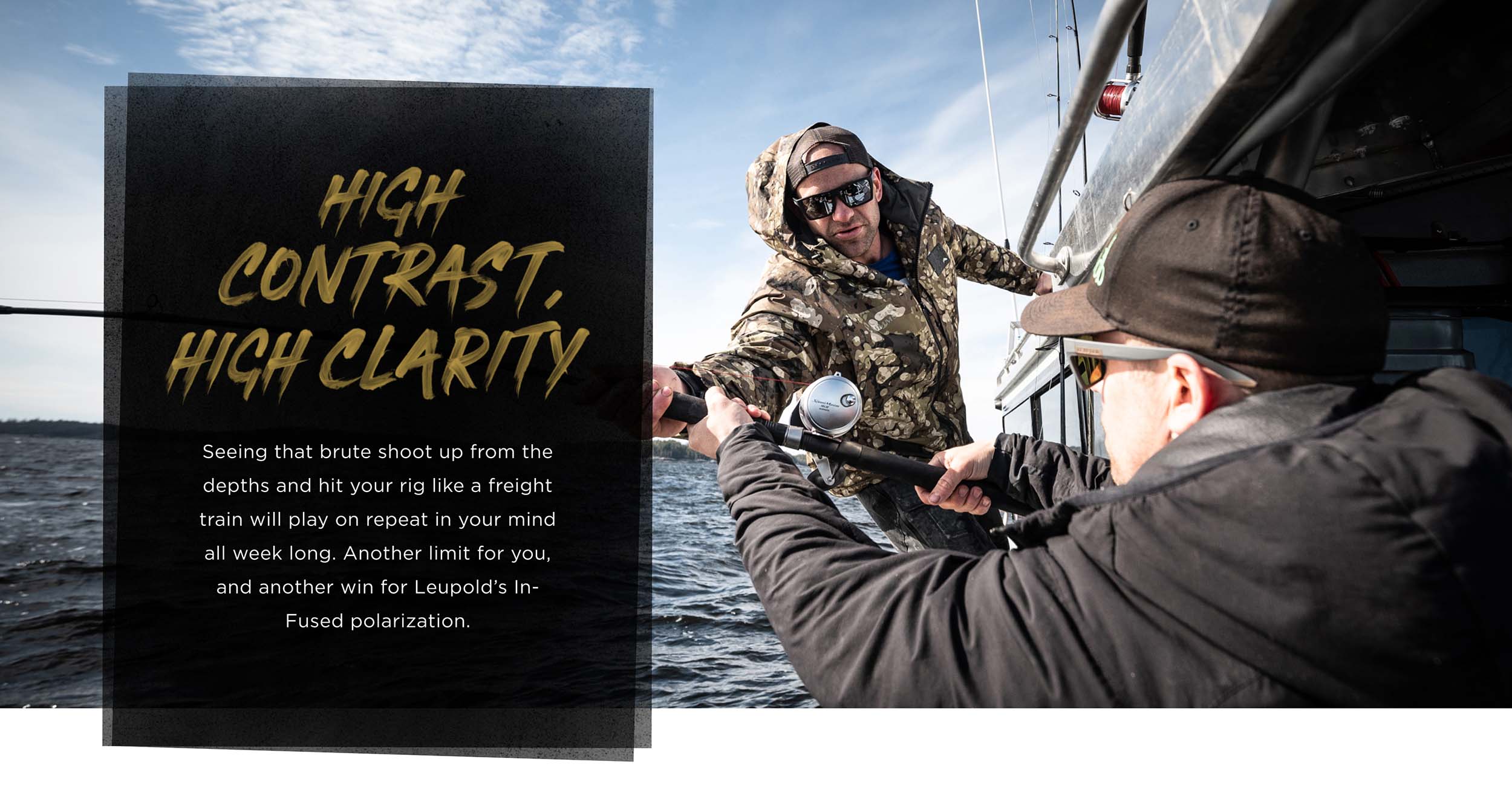 H1 "High Contrast, High Clarity" Two people on a boat using a fishing pole together deep-sea fishing.